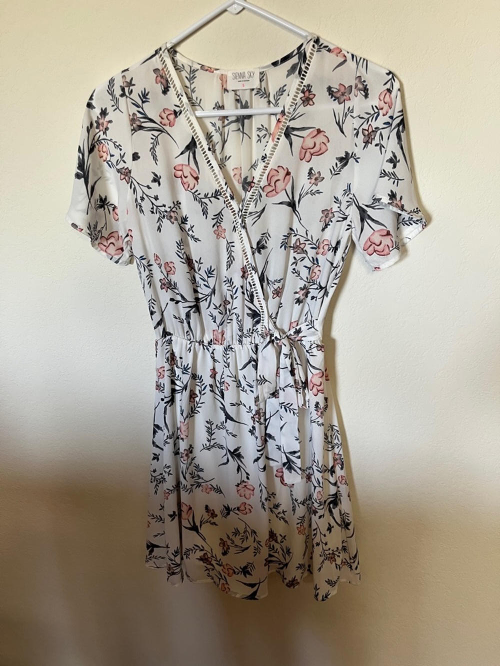 Sienna Sky White Floral Wrap Mini Dress with Pink Blossoms
new without tags.